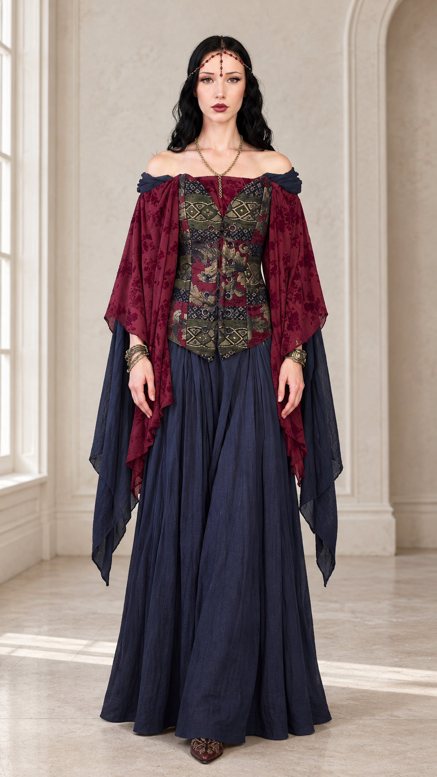 Front view of woman wearing navy and wine red medieval Renaissance off-shoulder maxi dress with jacquard bodice