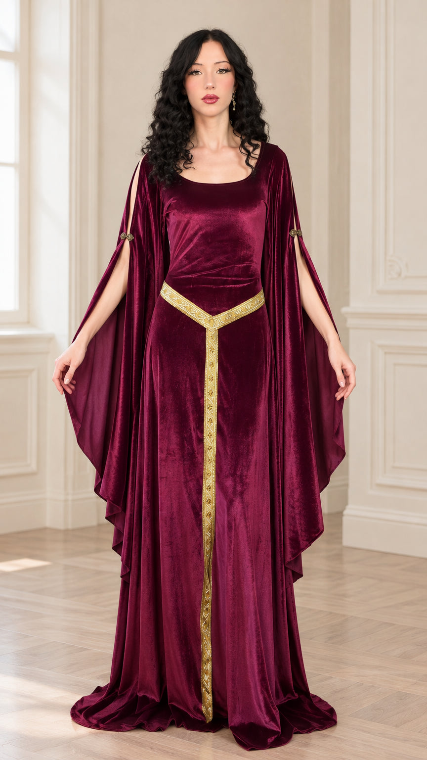 Front full-length view of woman in burgundy velvet Renaissance dress with gold trim and split sleeves
