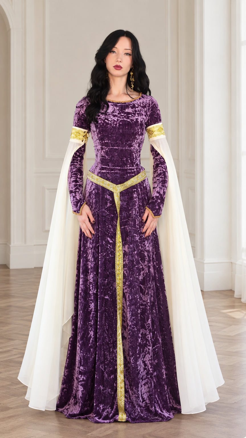Front full-length view of woman in purple crushed velvet medieval maxi dress with gold trim and sheer drape sleeves