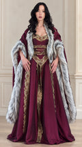 Front view of burgundy Renaissance embroidered gown with matching faux fur trimmed cape