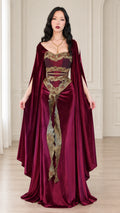 Front view of burgundy velvet medieval maxi gown with dramatic cape sleeves and gold embroidery