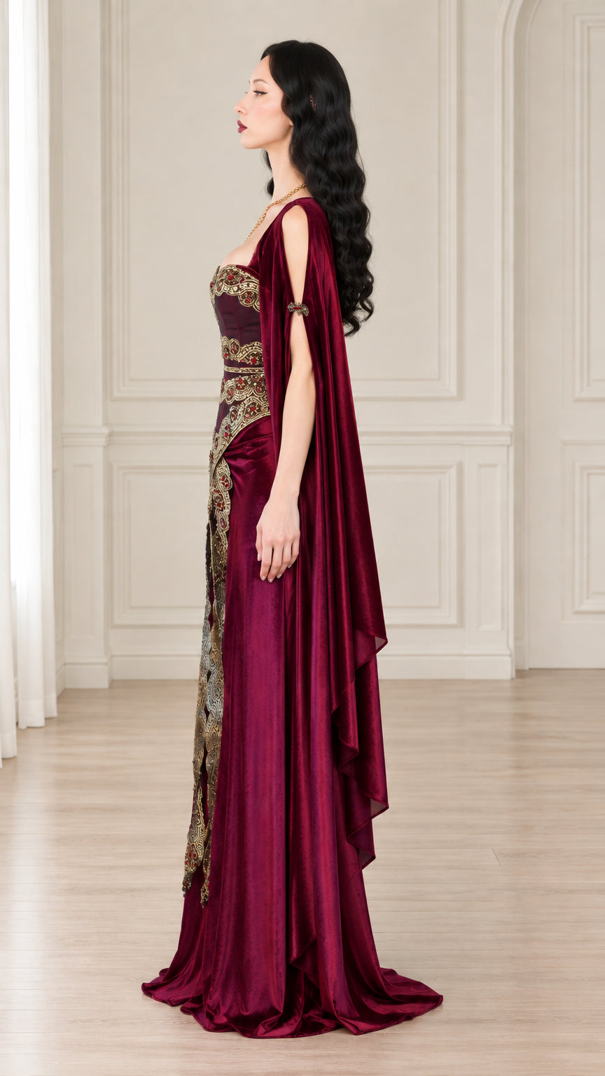 Side profile of burgundy velvet renaissance gown with draped sleeves