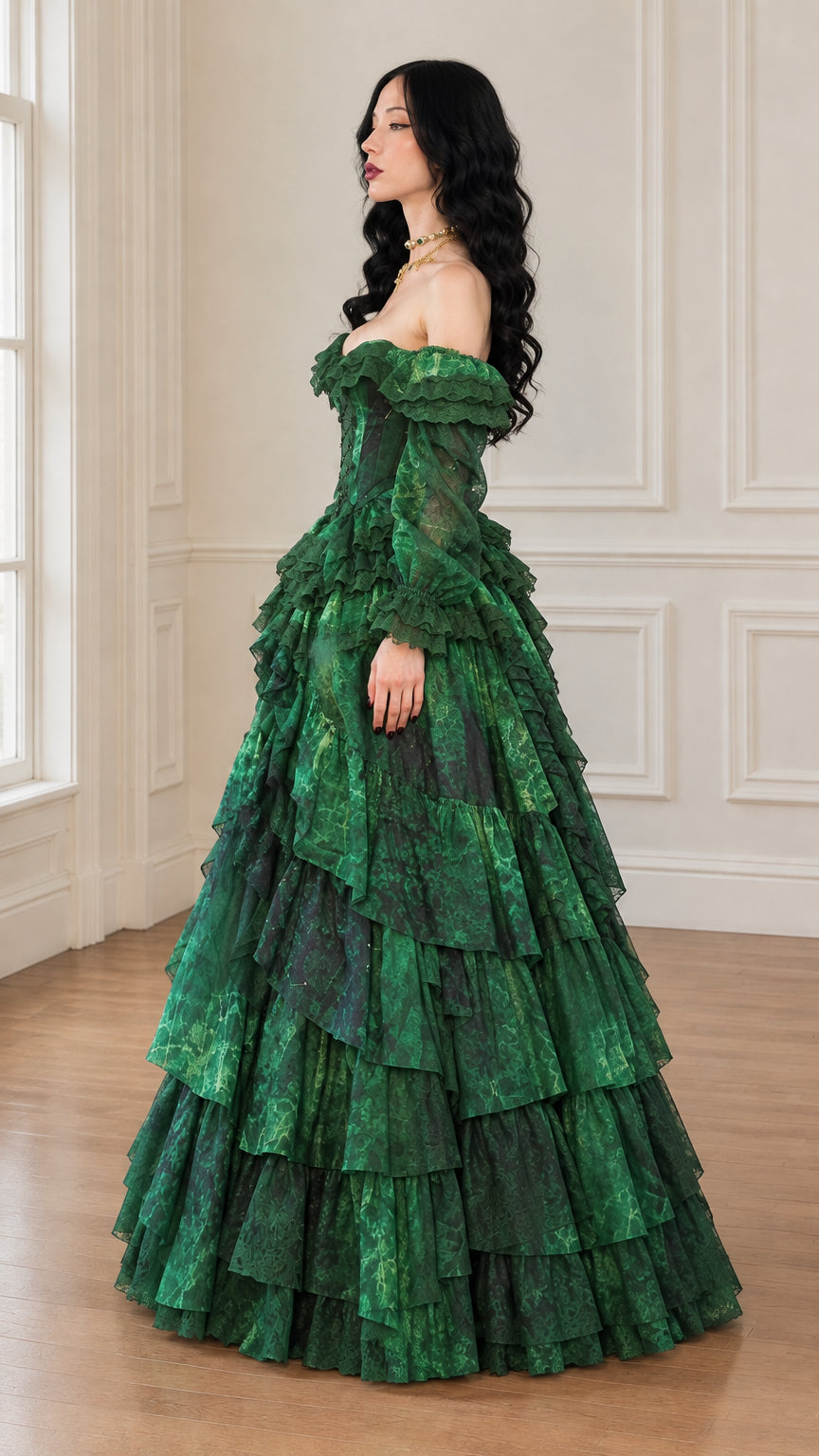 Side profile view showing the multi-layered tiered skirt in emerald green