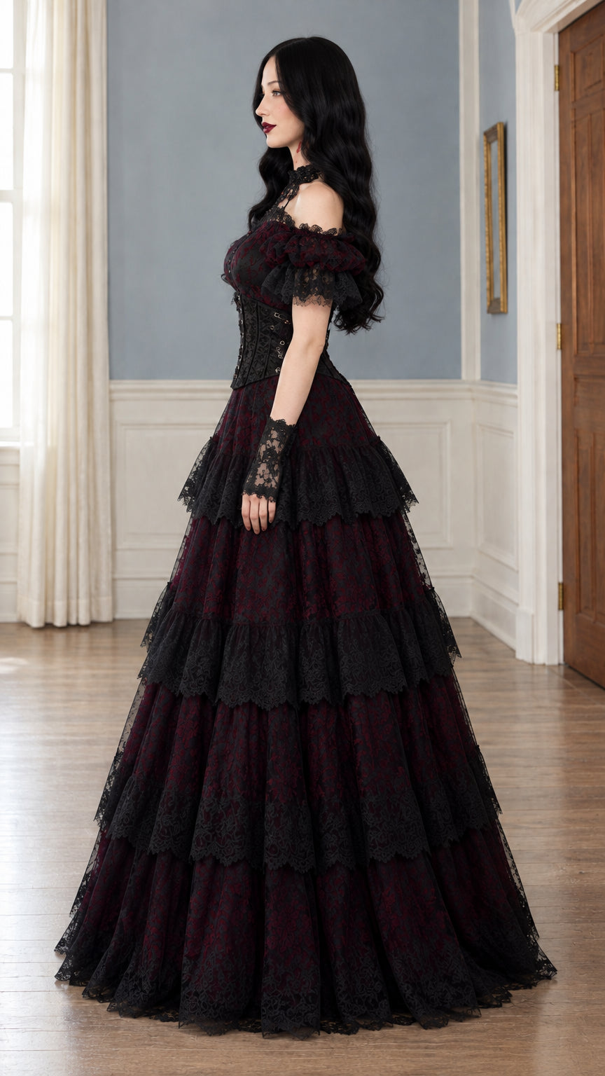 Side profile of model in burgundy Victorian tiered lace maxi dress