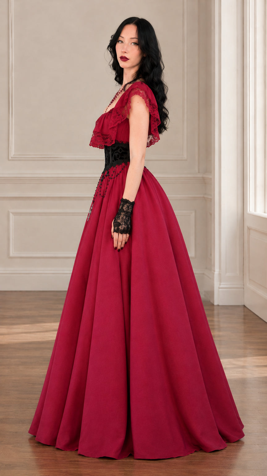 Side profile view of wine red Gothic Victorian maxi dress showing the full sweeping skirt