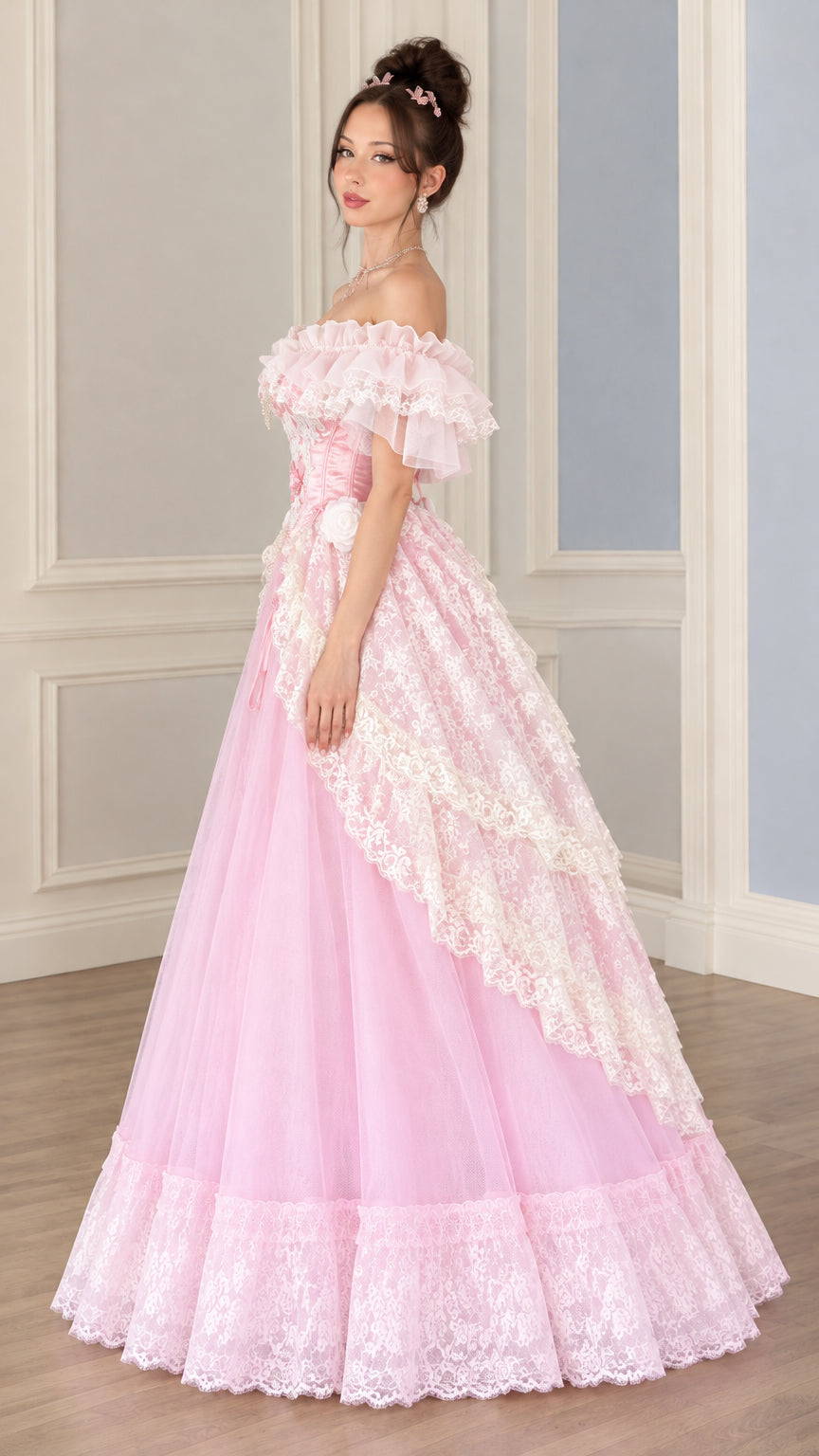 Side profile view of the pink Victorian ball gown showing dramatic skirt volume and scalloped lace drape
