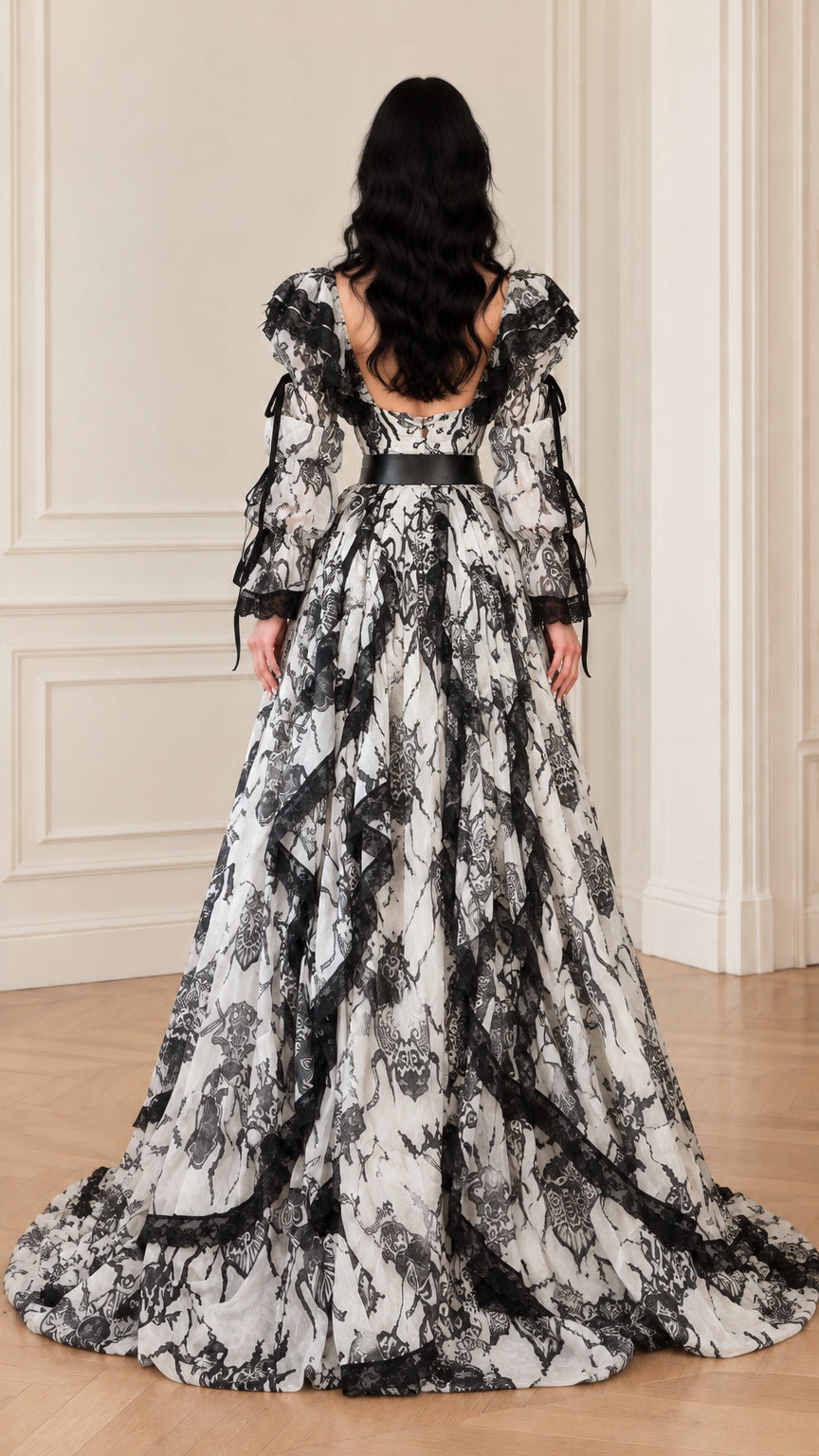Back view of white and black baroque lace maxi gown highlighting back bodice and train