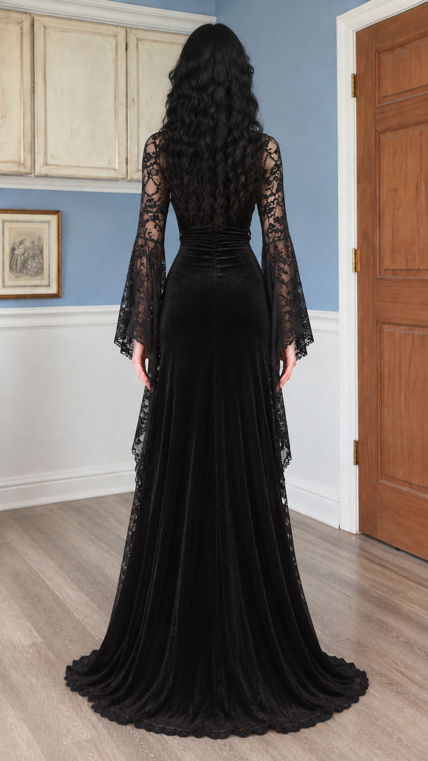 Back view of black velvet maxi dress featuring ruching and sweeping skirt hem