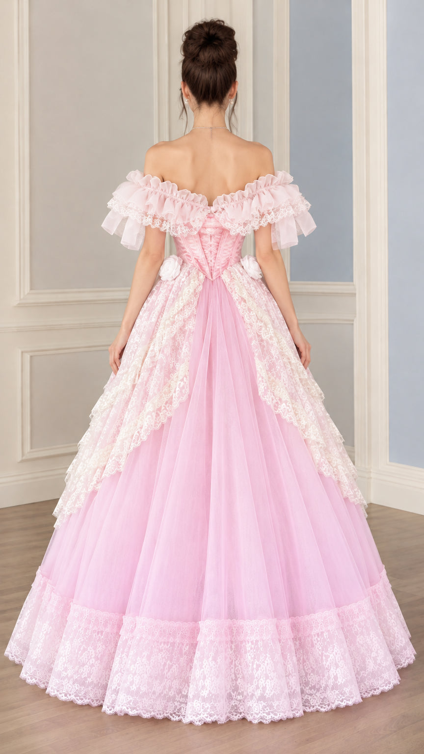 Back view of the pink corset ball gown highlighting lace-up back construction and wide sweeping hem