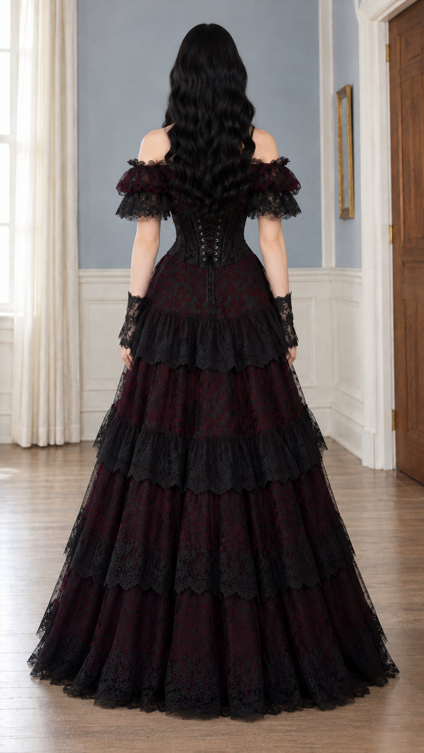 Back view of burgundy lace ball gown displaying adjustable corset lacing detail