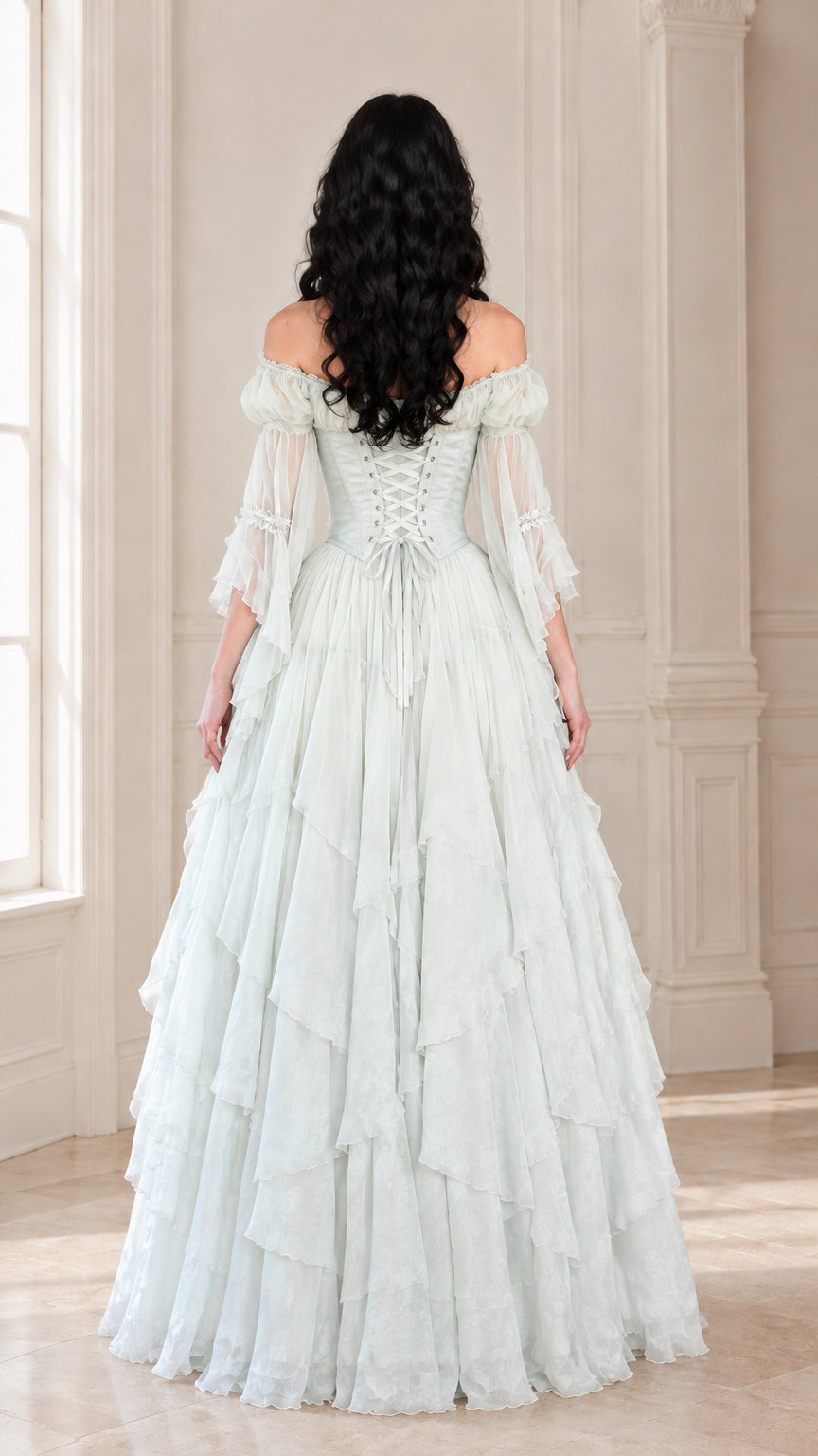 Back view of the mint green ball gown showcasing the adjustable lace-up corset closure