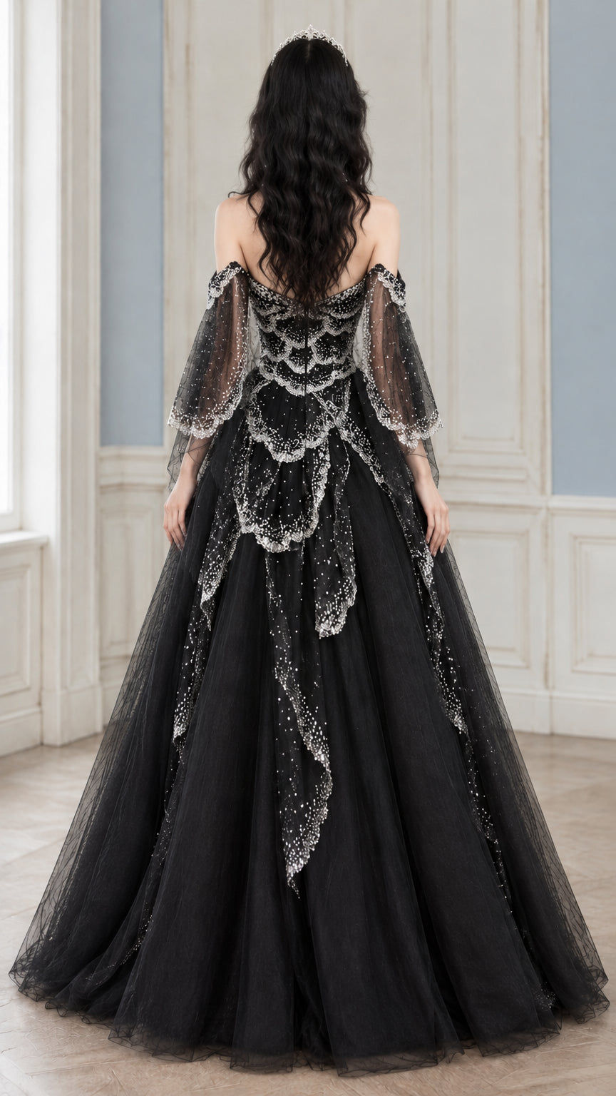 Back view of black sequin bodice tulle ball gown with sheer sleeves