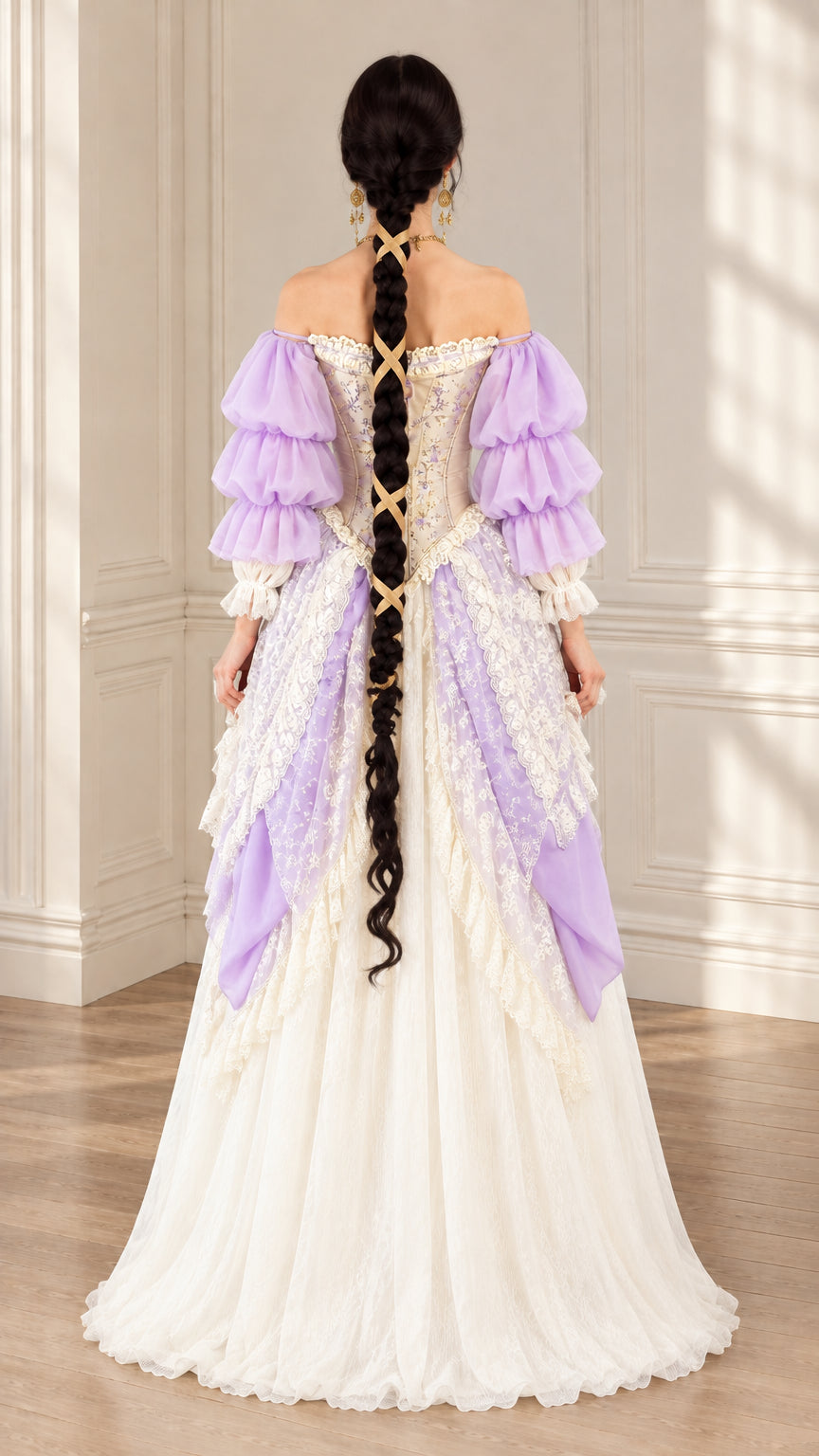 Back view of model in lavender off-shoulder Victorian gown with flowing white maxi skirt