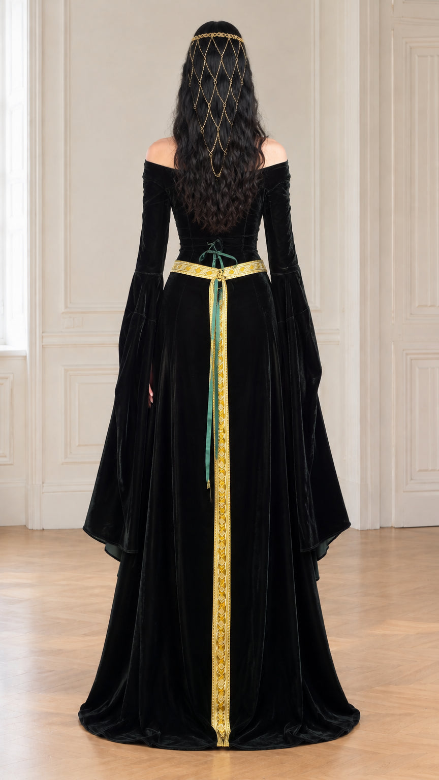 Rear view of black velvet gown highlighting the adjustable lace-up corset back detail and gold waist accent