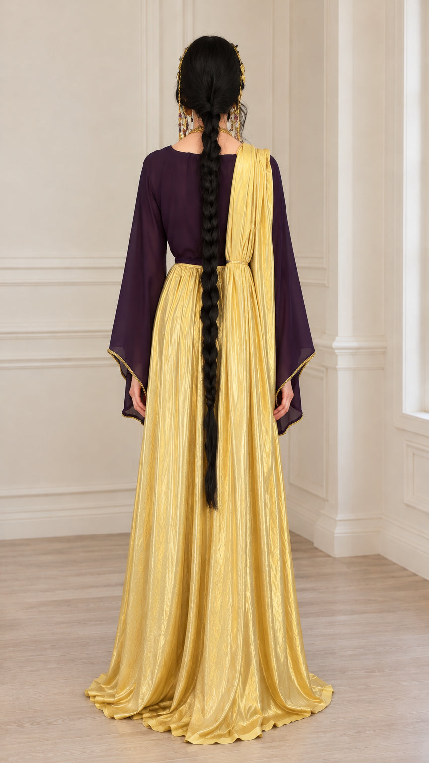 Back view of model wearing purple and gold maxi dress with draped shoulder sash