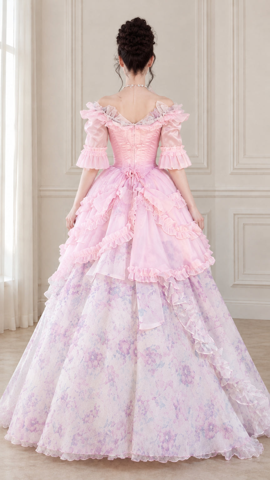 Back view of pink Victorian Rococo ball gown displaying corset lacing and cascading bustles