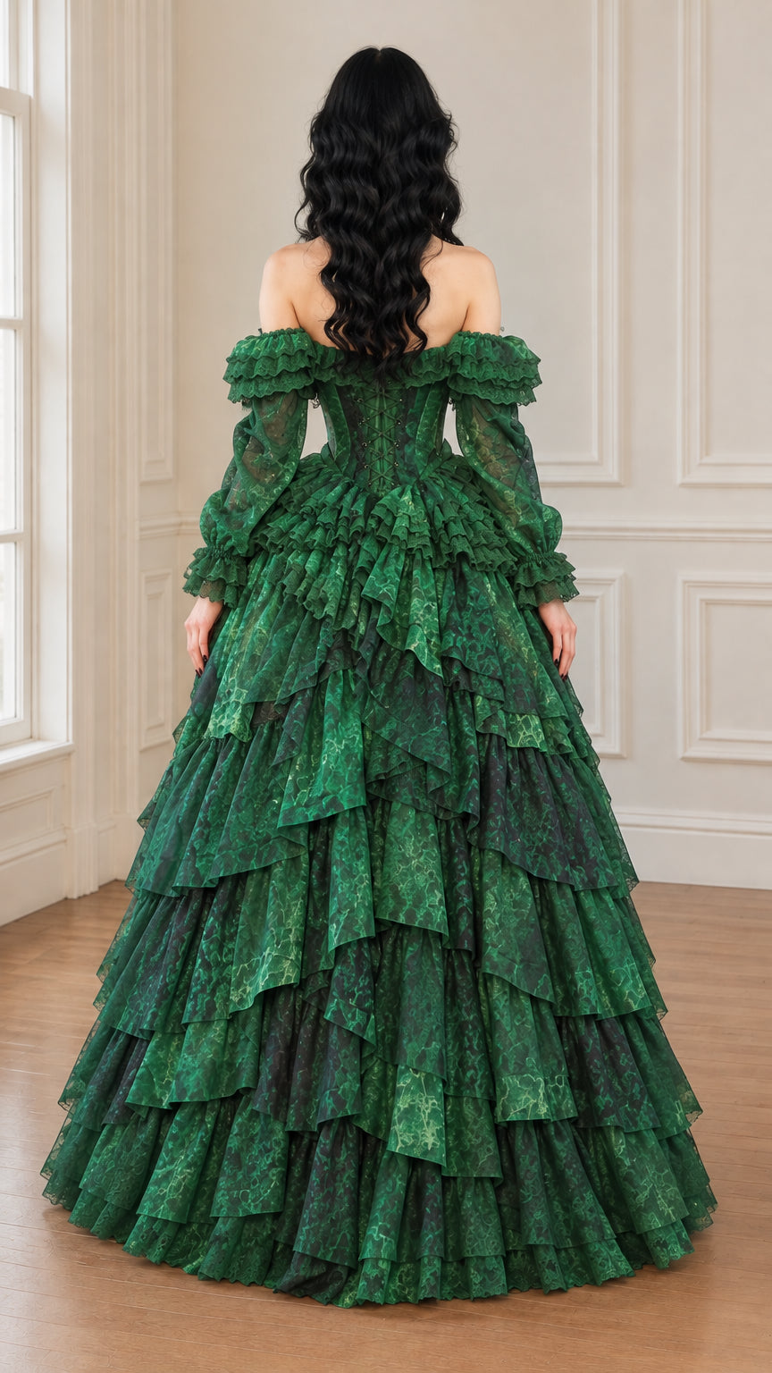 Back view of the emerald green long-sleeve tiered ball gown