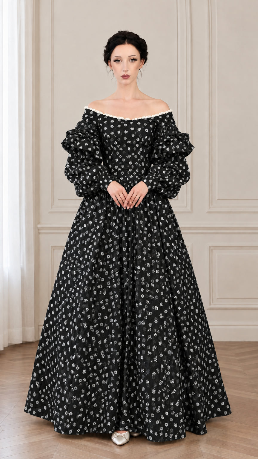 Front view of black floral off-the-shoulder historical ball gown with tiered lantern sleeves