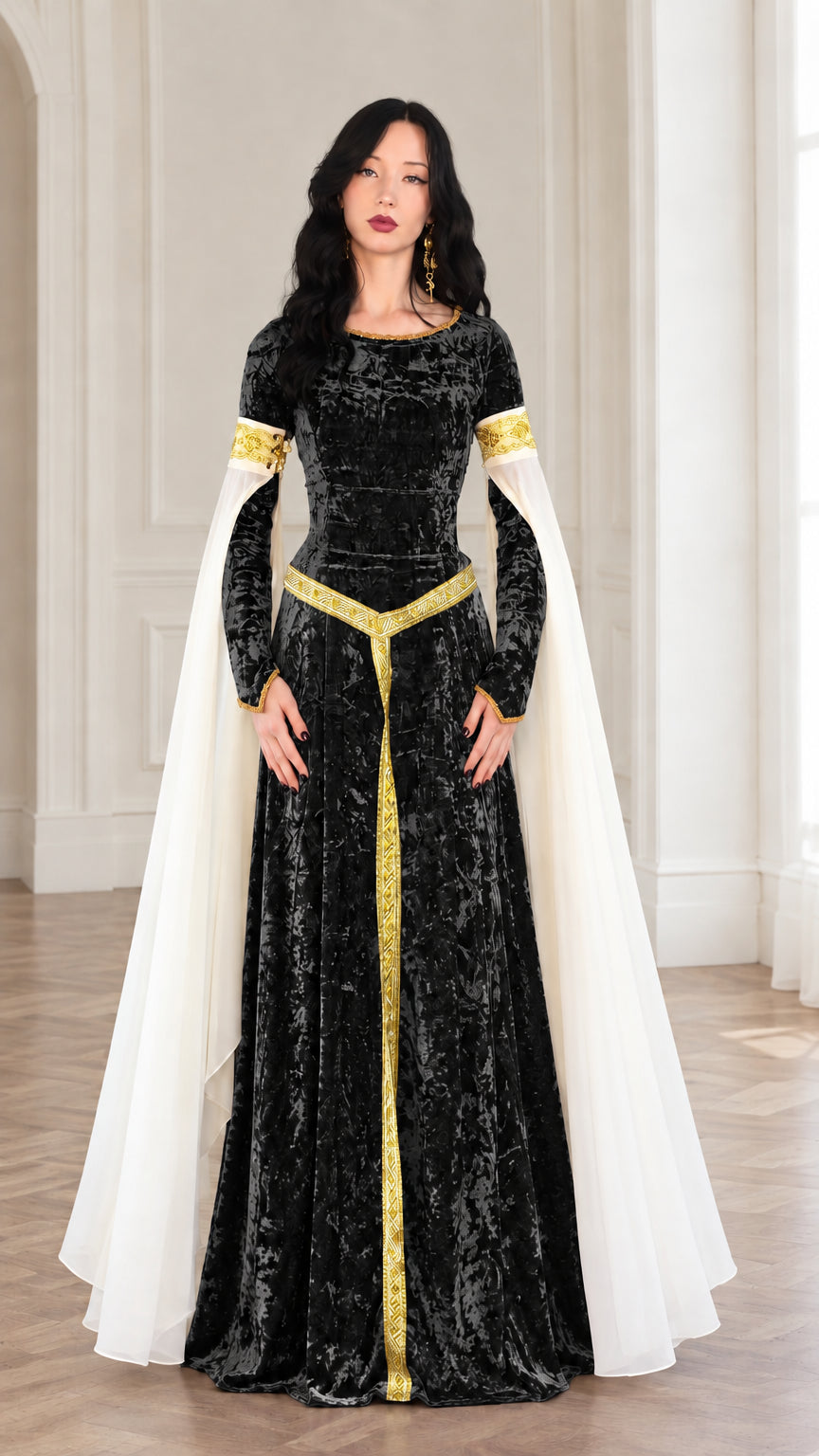 Front full-length view of black crushed velvet medieval gown with gold embroidery and white drape sleeves