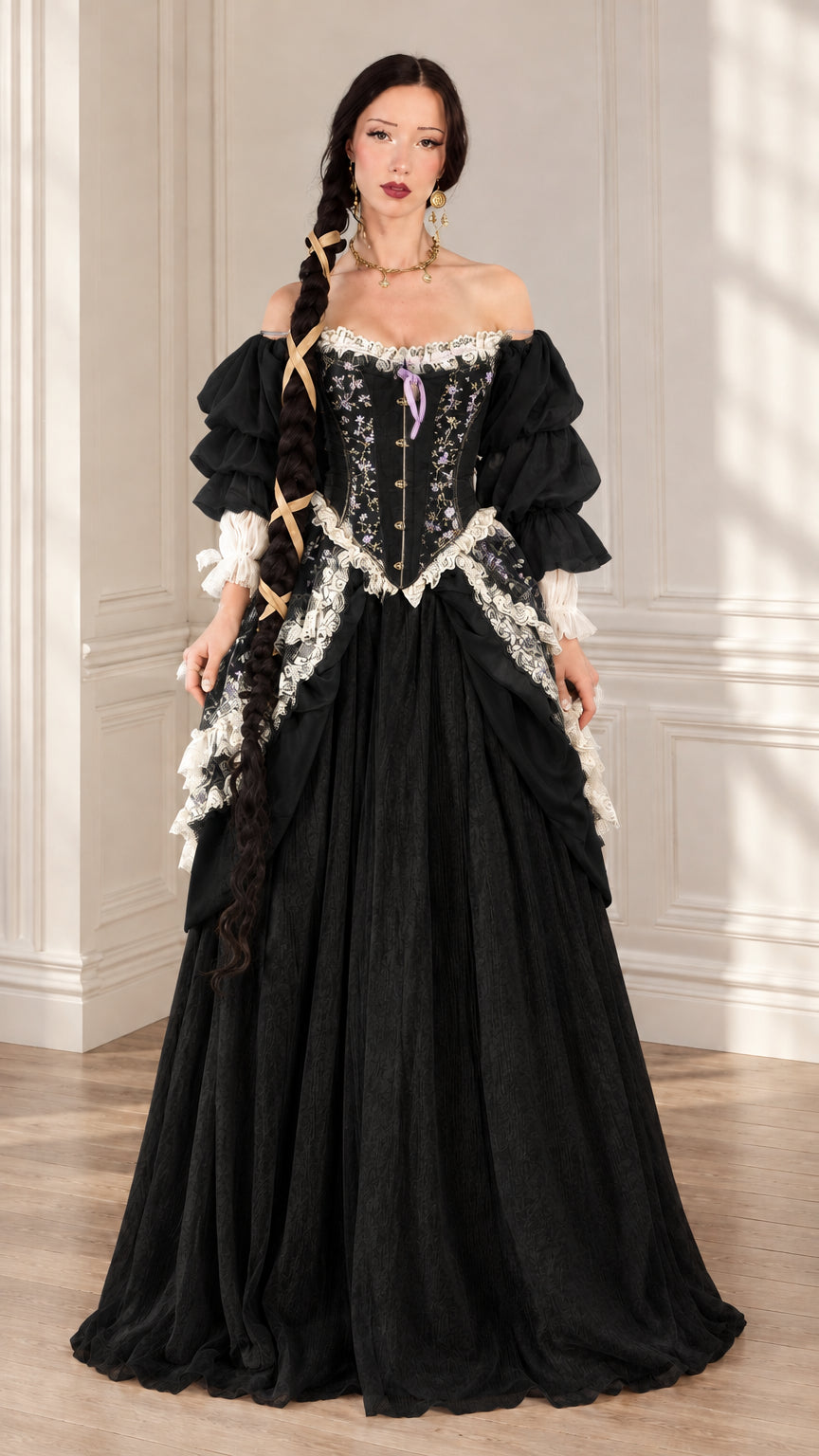 Black Renaissance corset ball gown with contrasting white lace trim and tiered sleeves