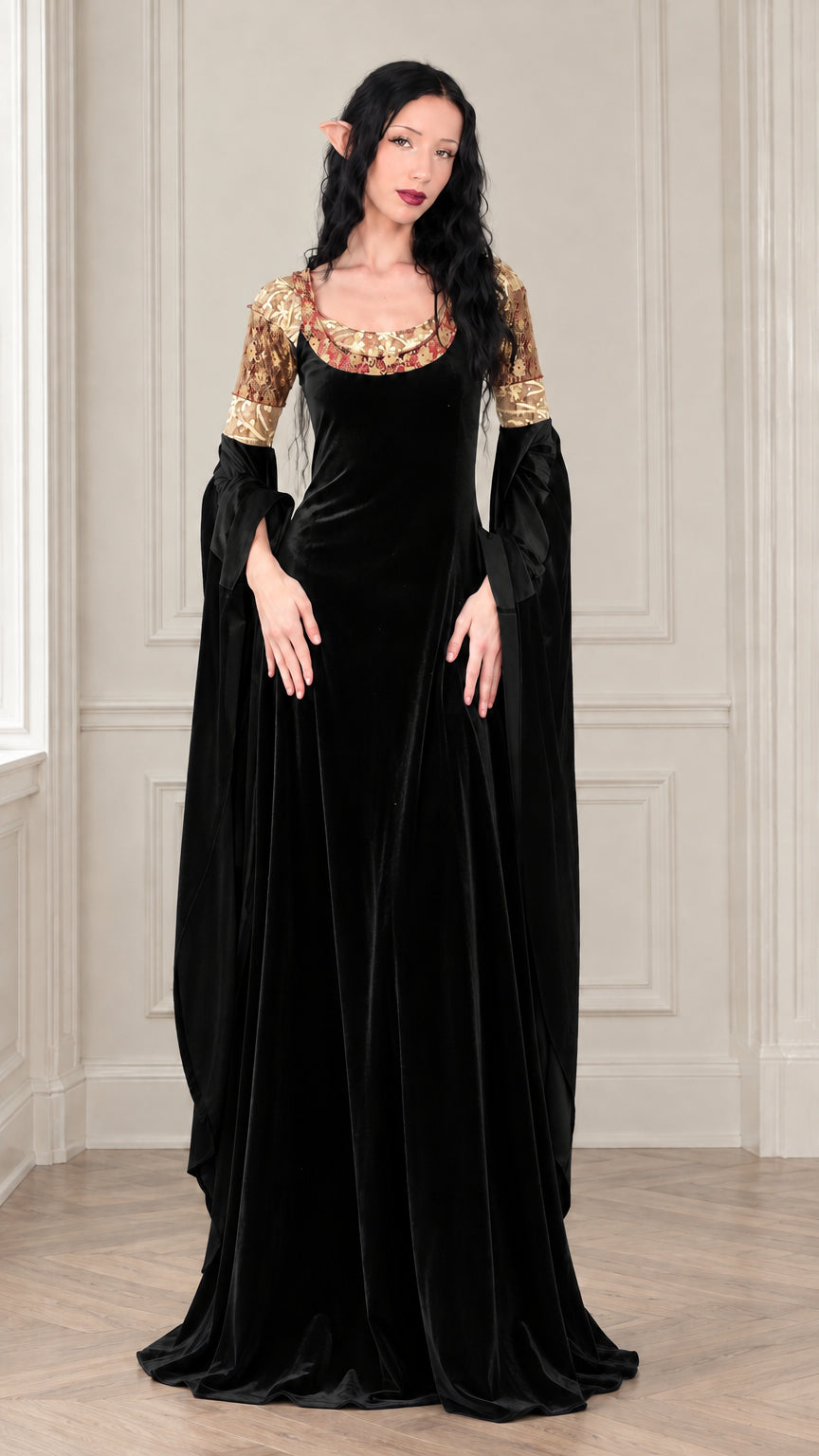 Full-length front view of black velvet medieval gown with matching black drape sleeves and gold lace