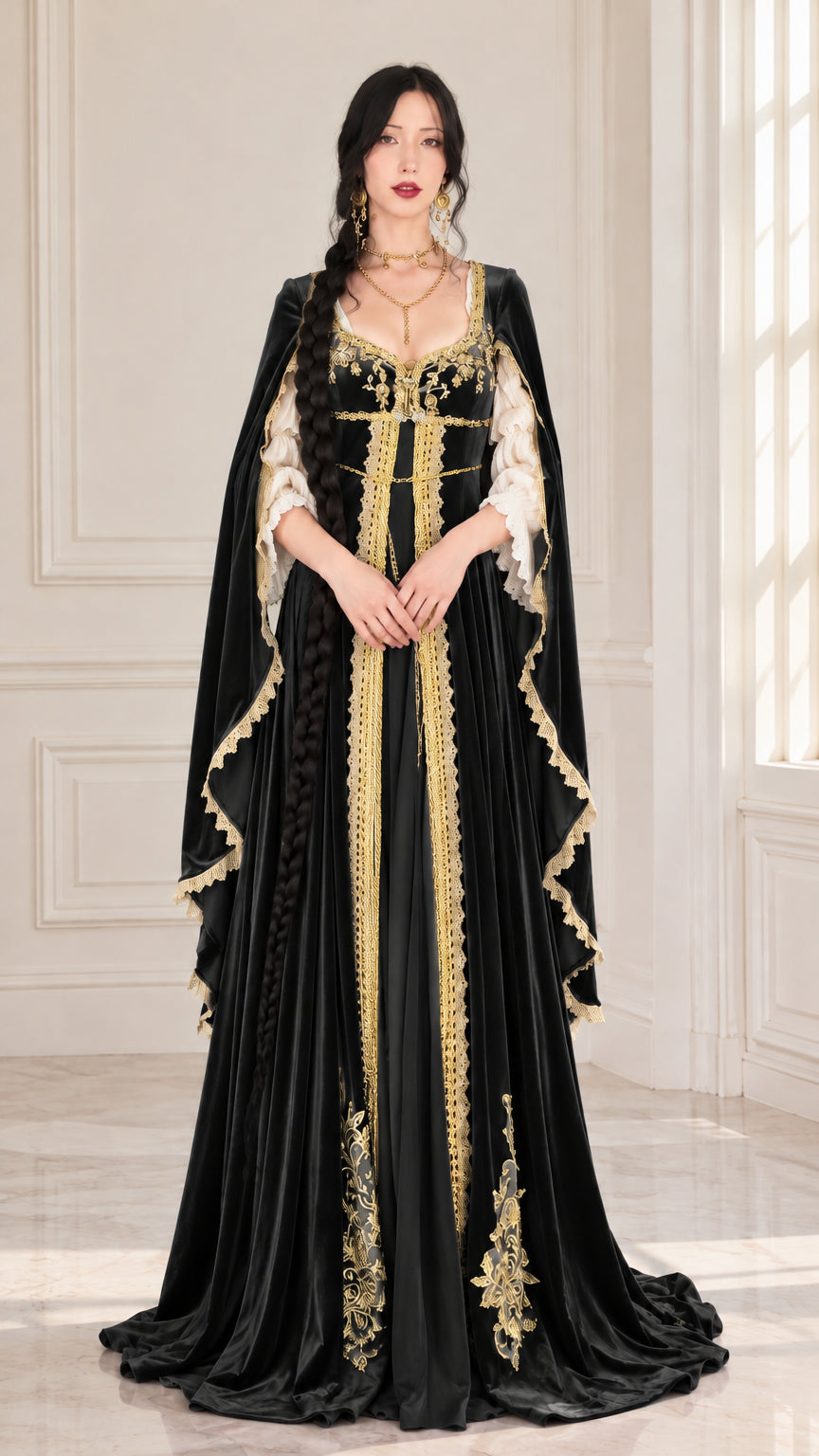 Front full-length view of black Renaissance velvet gown with gold embroidery and cape sleeves