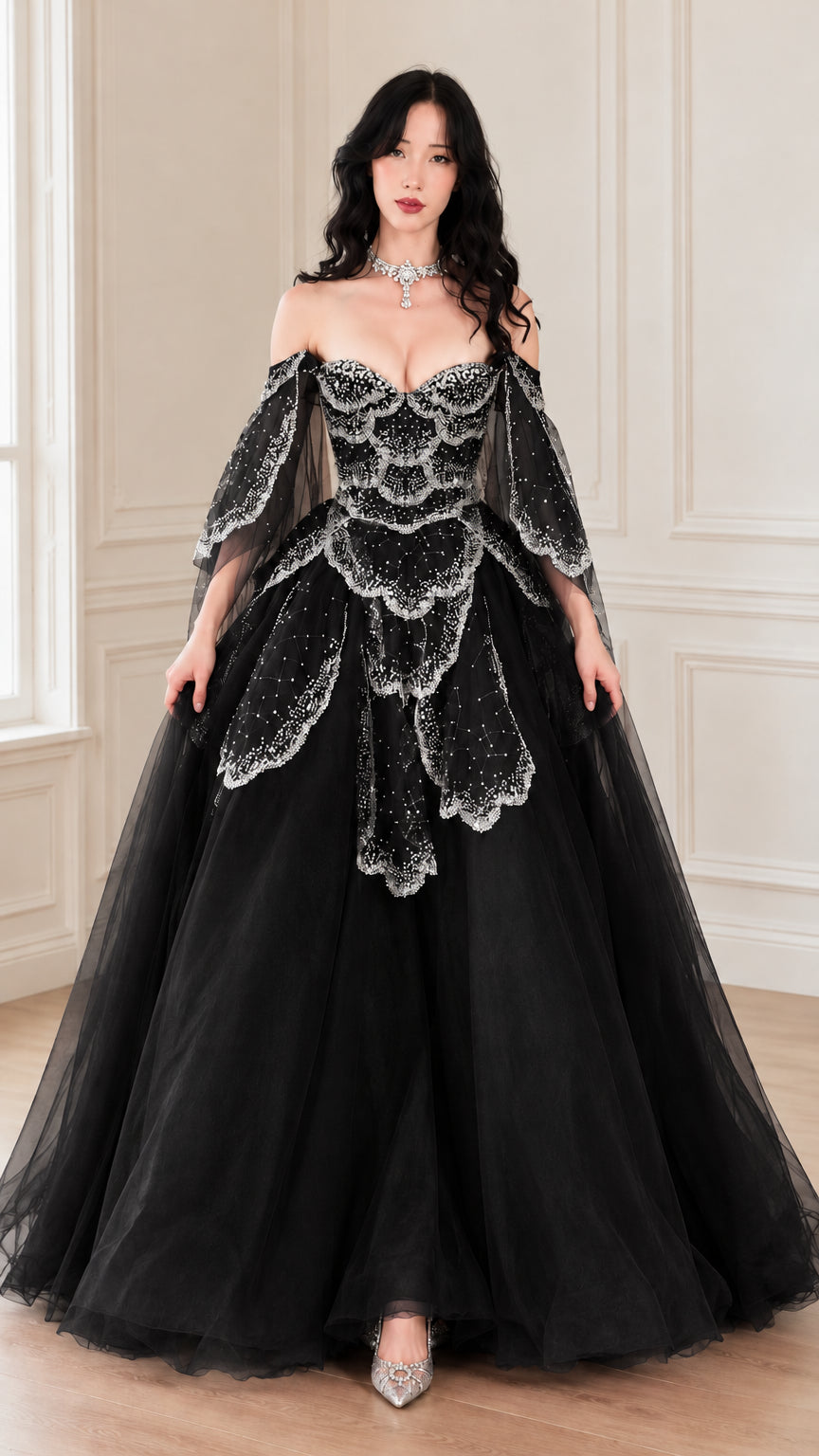 Front view of woman wearing black off-the-shoulder beaded tulle ball gown