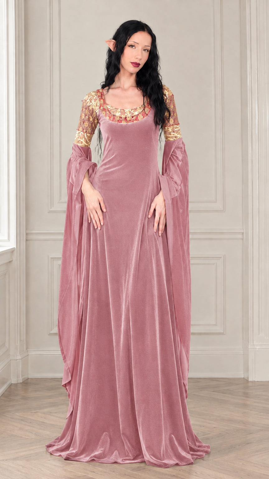 Full-length front view of dusty rose pink velvet renaissance gown with gold embroidered neckline