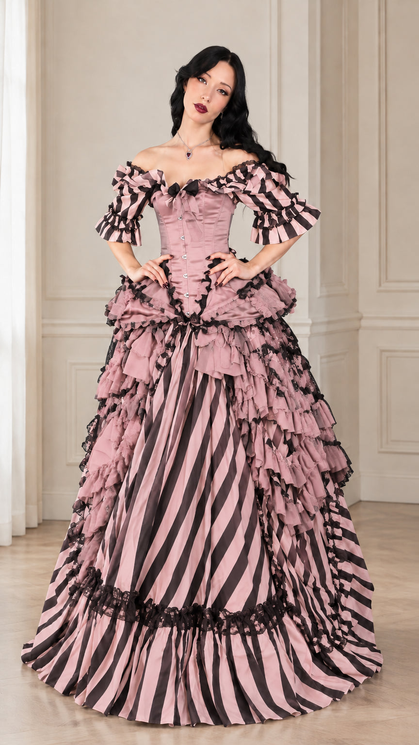 Front view of model wearing dusty pink and white striped Victorian gothic ball gown