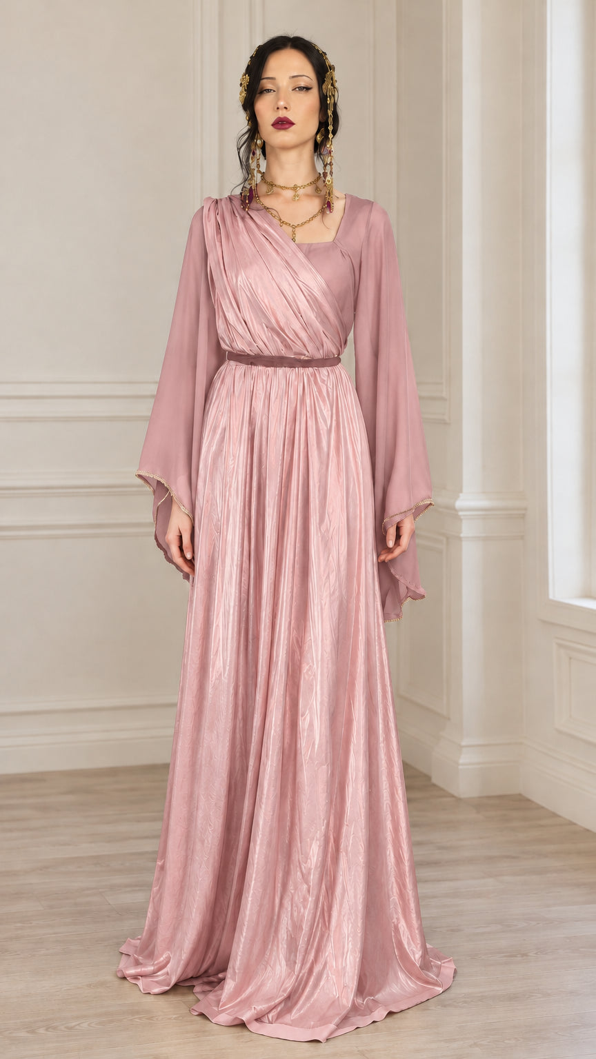 Front view of model wearing dusty rose pink draped maxi dress with bell sleeves
