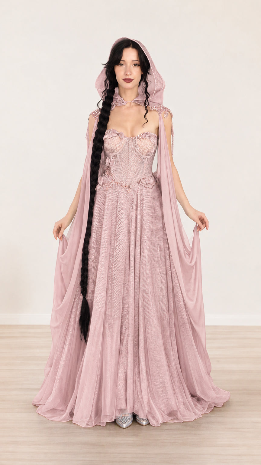 Full-length view of blush pink hooded evening dress with 3D floral accents