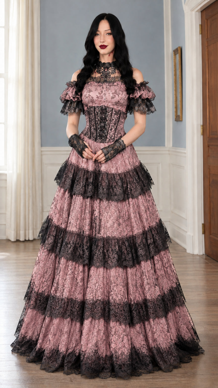 Front view of model wearing dusty pink and black tiered lace corset gown
