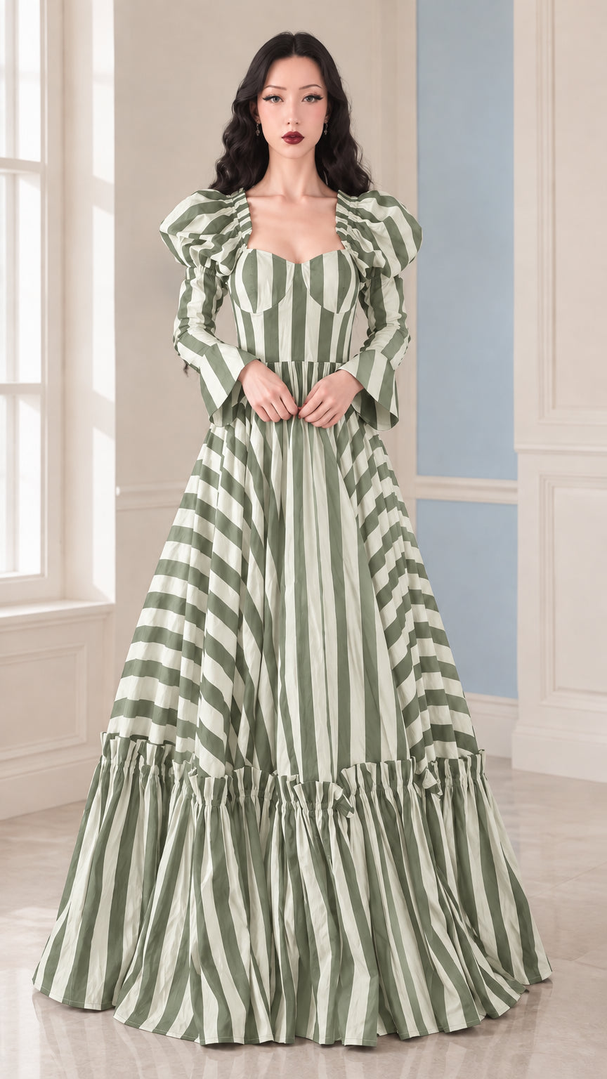 Front view of woman wearing Sage Green and White striped sweetheart tiered maxi gown