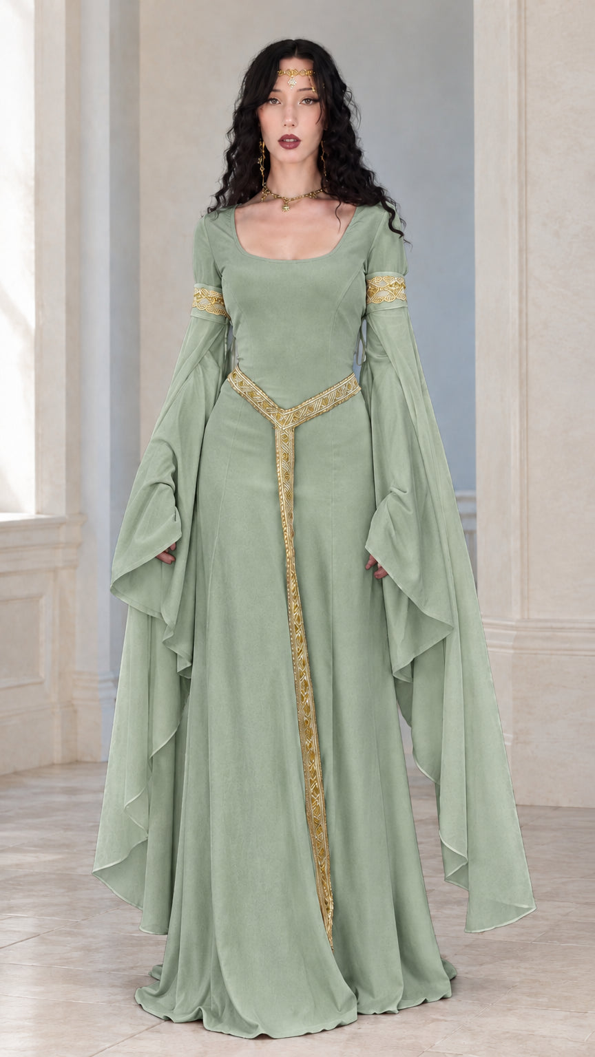 Full front view of woman wearing a sage green medieval gown with gold trim and flowing sleeves
