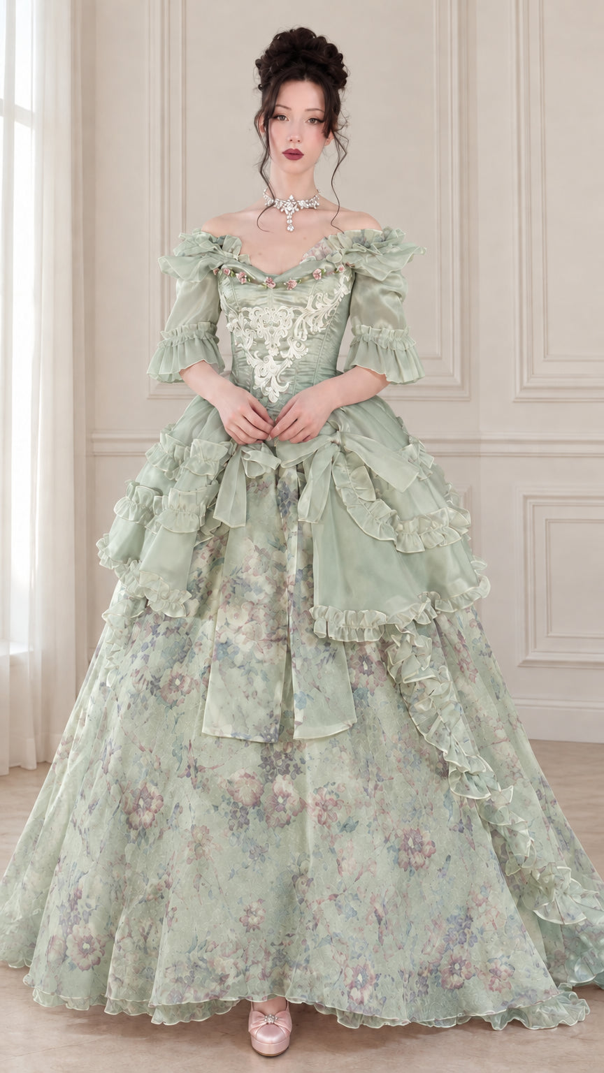 Front view of woman wearing sage green floral Victorian Rococo corset ball gown