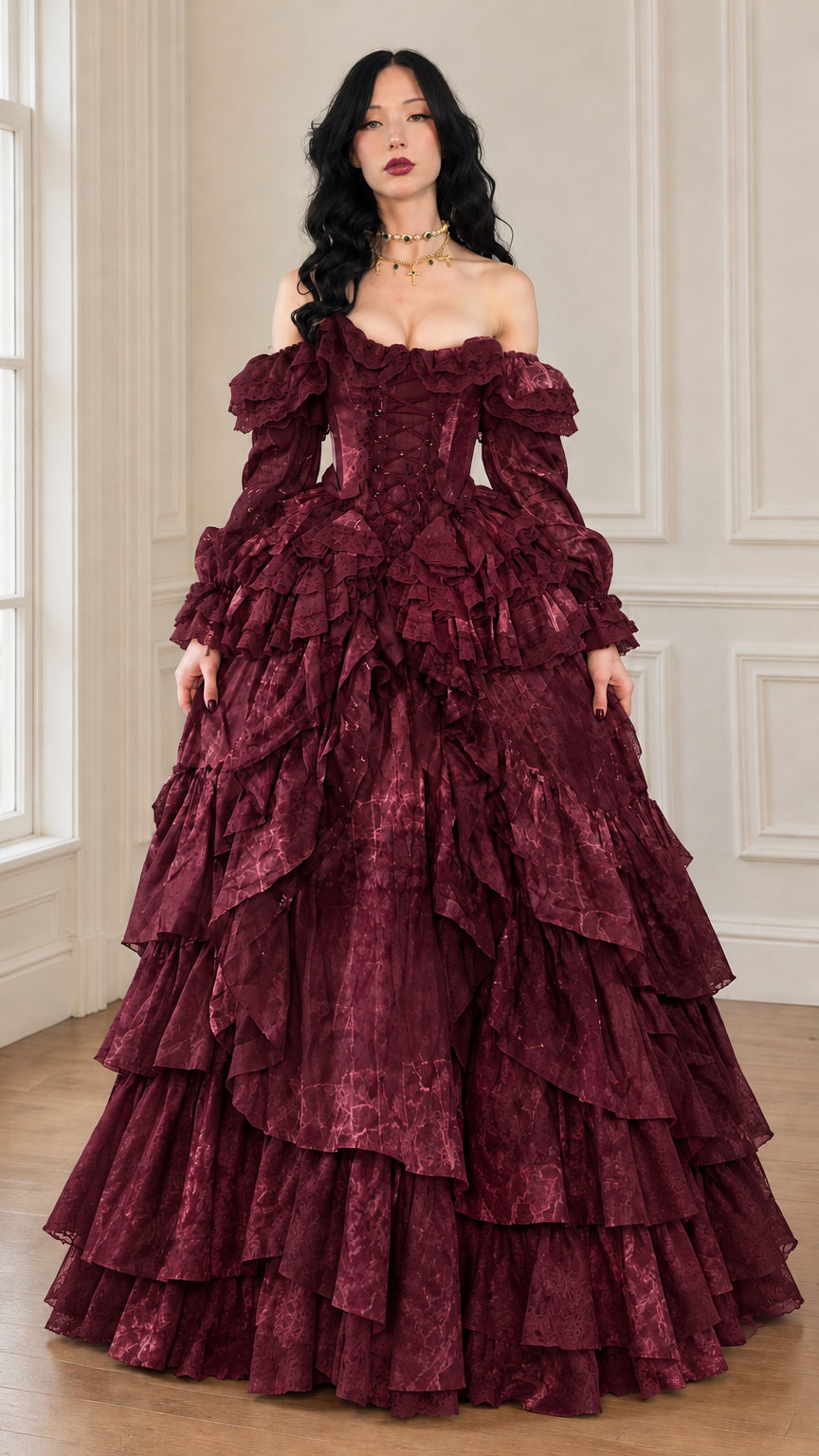 Front view of the tiered off-shoulder ball gown in burgundy
