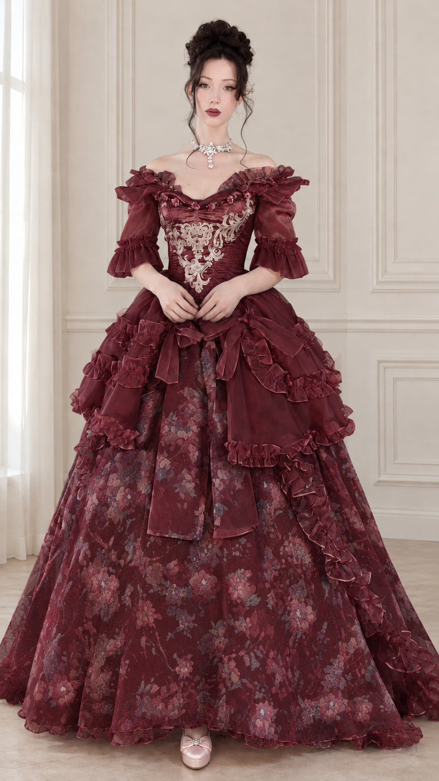 Front view of woman wearing burgundy wine red floral Victorian Rococo corset ball gown