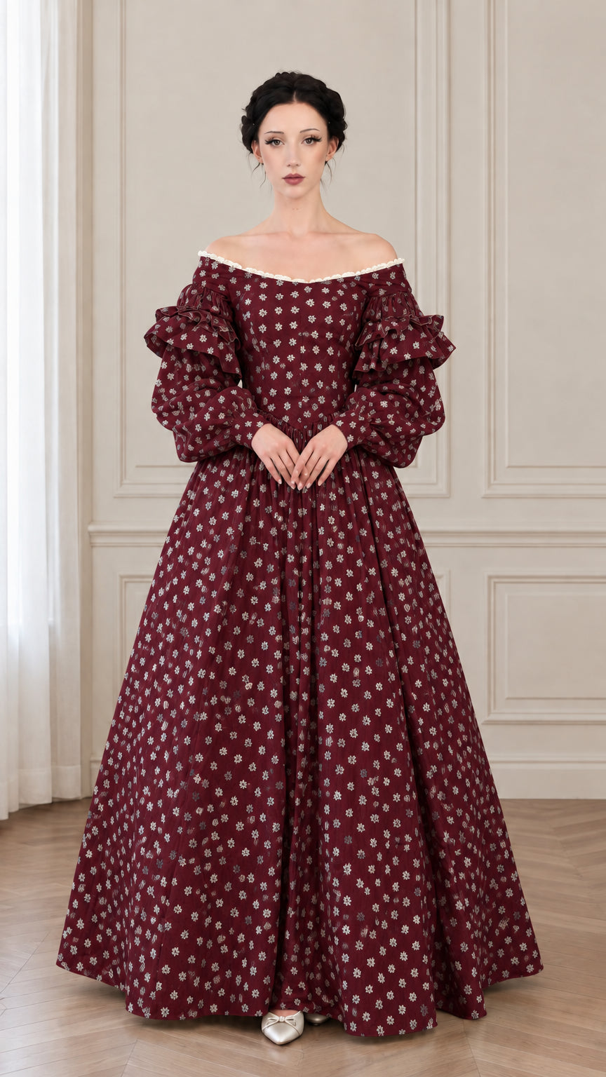 Front view of burgundy wine floral historical ball gown with dramatic tiered sleeves