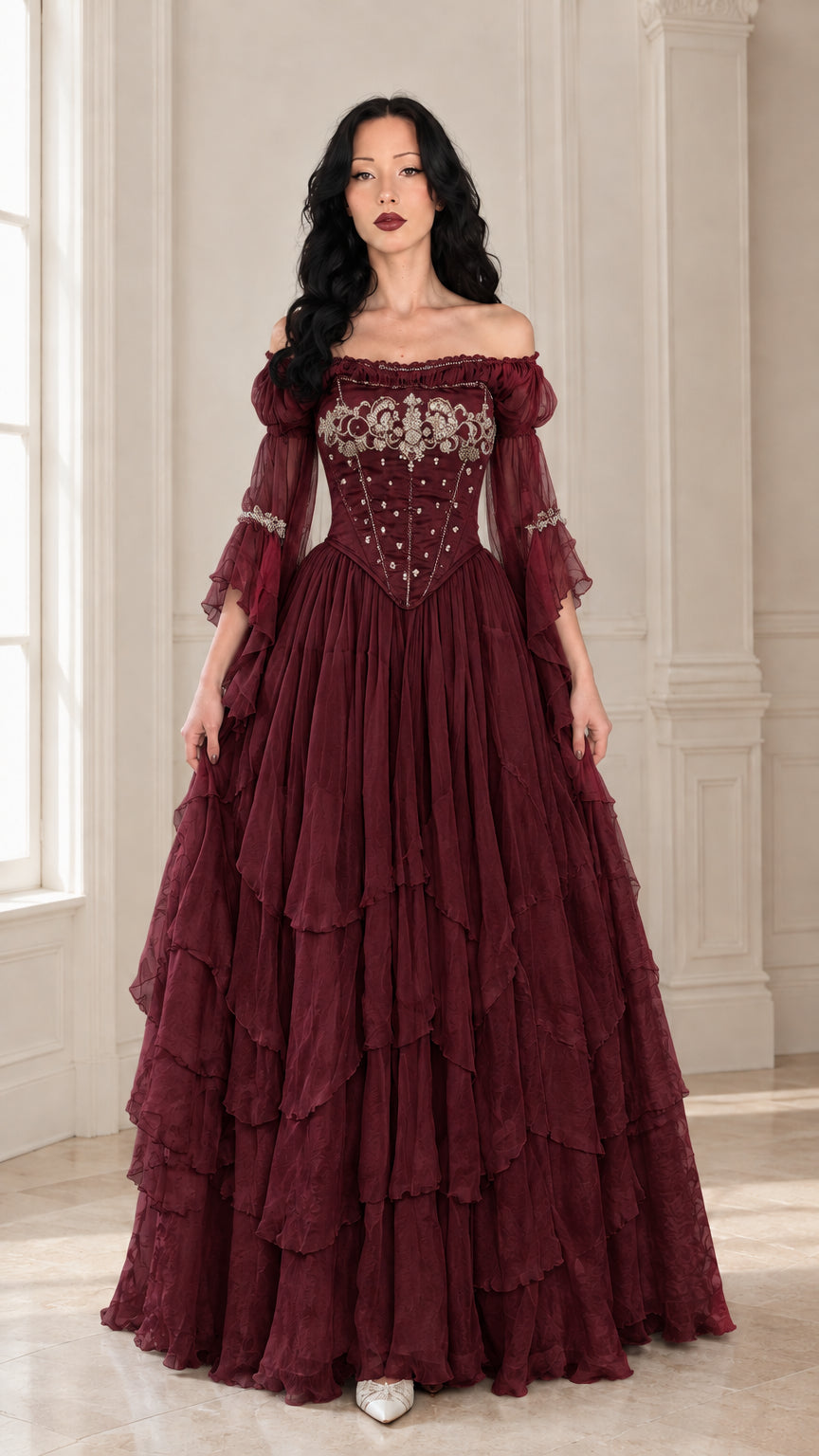 Front view of the embroidered corset ball gown in rich burgundy