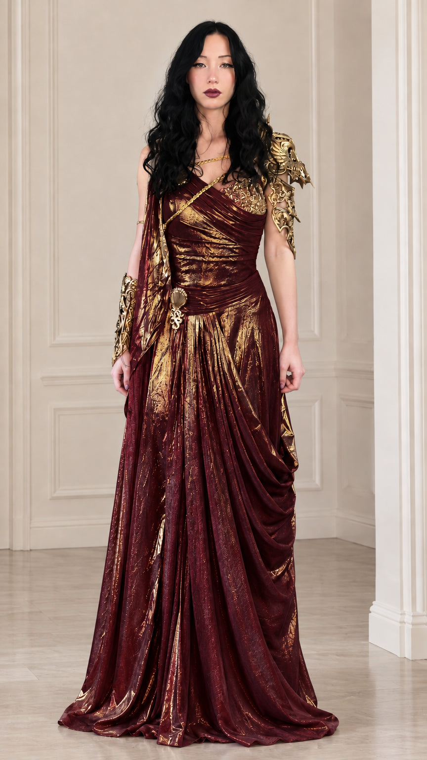 Burgundy wine red metallic draped ball gown with golden accents