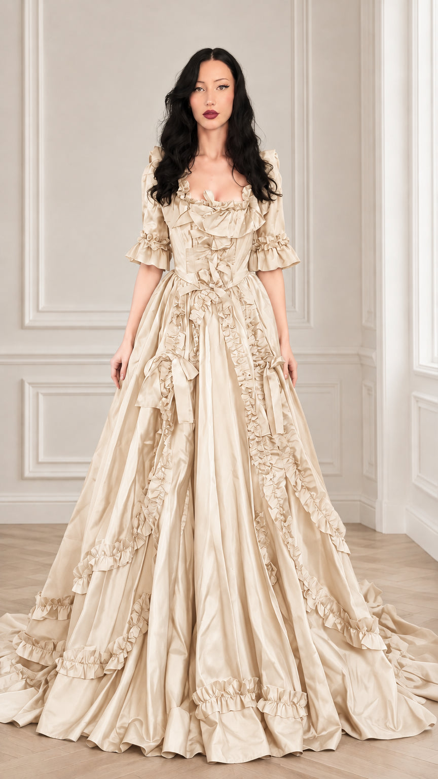 Woman wearing a champagne beige Victorian ruffled floor-length ball gown dress