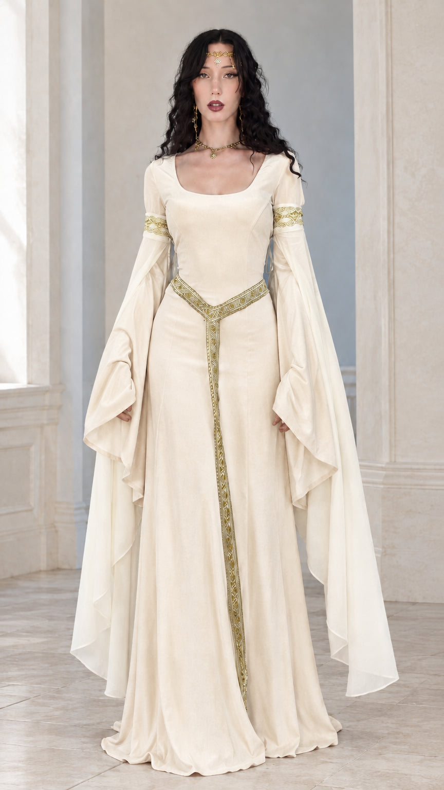 Full front view of woman wearing a cream ivory medieval gown with gold trim and draped sleeves